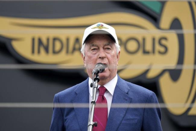 Indianapolis Motor Speedway owner Roger Penske delivers the command "ladies and gentlemen start your engines" before the start of the Indianapolis 500 auto race at Indianapolis Motor Speedway in Indianapolis, Sunday, May 28, 2023. (AP Photo/AJ Mast)